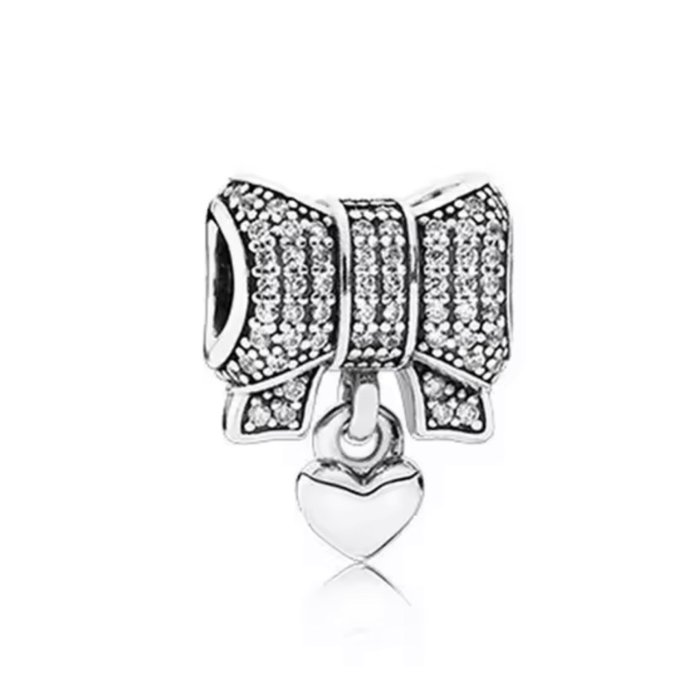 Elegant Silver Bow Charm with Heart Pendant